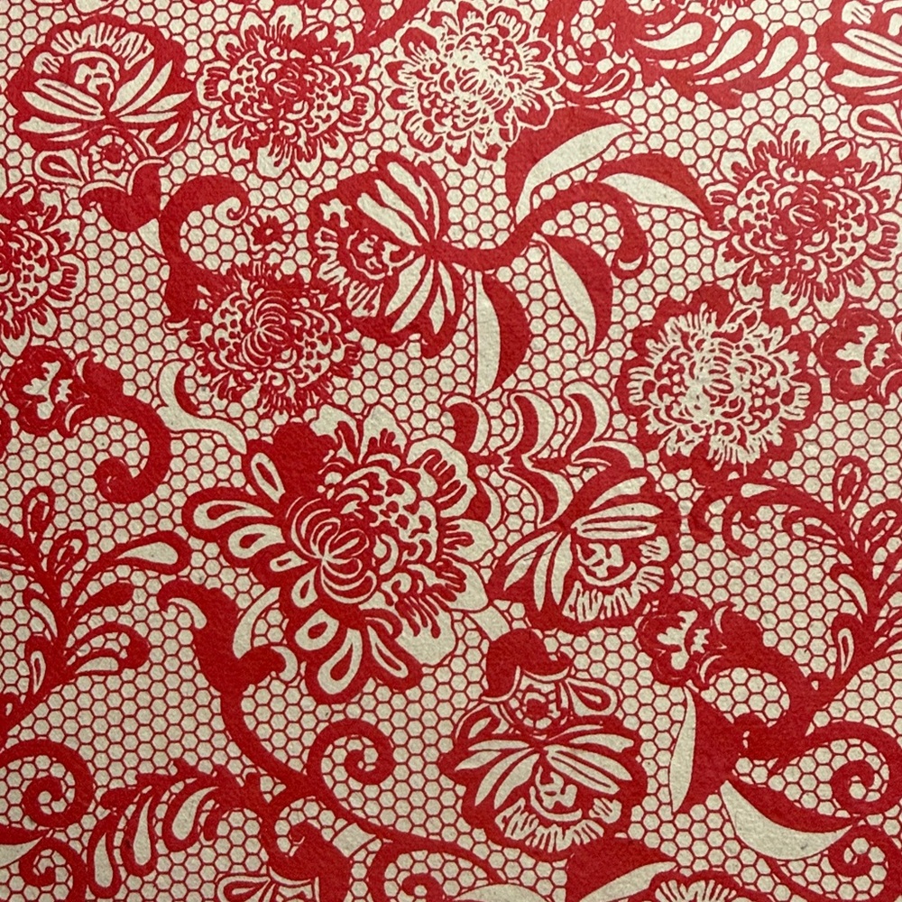 Coming soon! Red lace-like cover design. Hand Sewn Artist Journal Made in Alaska
